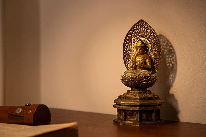 Golden Bodhisattva statue on lotus pedestal